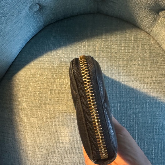 Salvatore Ferragamo Black Quilted Vara Zip Around Wallet with Gold Hardware. - Picture 5 of 9